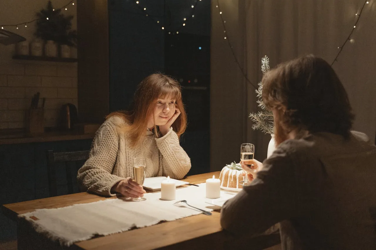 Couple enjoying a romantic dinner in Toronto — the kind of date a matchmaker arranges